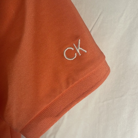 Small orange Calvin Klein short sleeve golf shirt - Picture 3 of 3